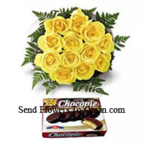 Um buquê de 12 rosas amarelas e uma caixa de chocolate